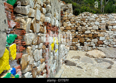 Painted stone and brick wall Stock Photo
