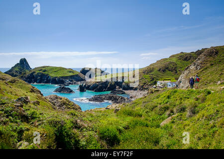 Kynance Cove, West Cornwall, Lizard Peninsula, England, UK with walkers on the South West Coast Path Stock Photo