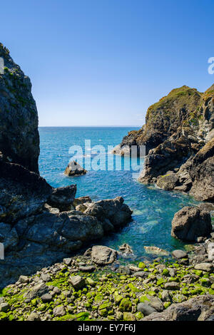 Rocks and headland at Mullion Cove, Lizard Peninsula, Cornwall, England, UK Stock Photo