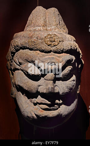 Head of Lokapala stone Tang dynasty (ad 618–690 & 705–907)  Shanghai Museum of ancient Chinese art China ( Lokapāla guardian of the world has different uses depending on whether it is found in a Hindu or Buddhist context. ) Stock Photo