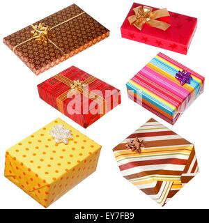 Various gifts isolated on white. Boxes wrapped with colorful paper, bow on each present Stock Photo