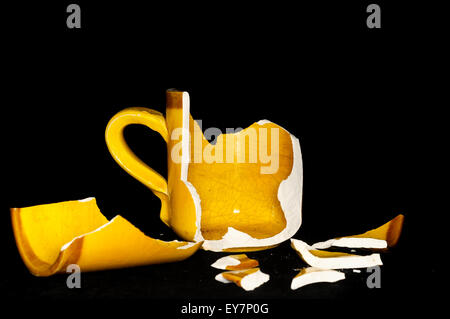 Broken Orange Coffe Cup Stock Photo