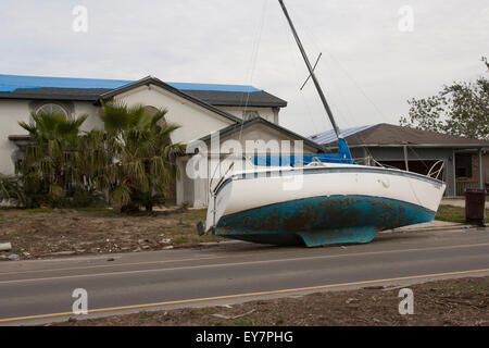 A sailboat on the street in front of a house in Slidell, Louisiana in the aftermath of Hurricane Katrina. Stock Photo