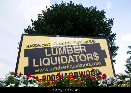 A logo sign outside of the headquarters of Lumber Liquidators, Inc., in Toano, Virginia on July 18, 2015. Stock Photo