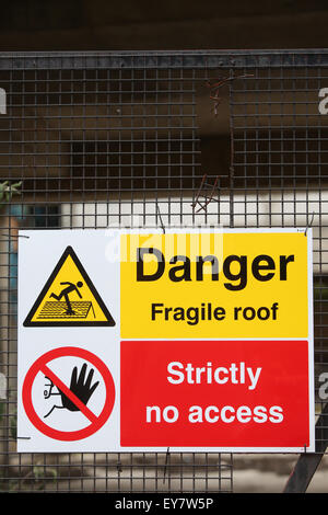 Building site safety signs Danger fragile roof strictly no access Stock ...