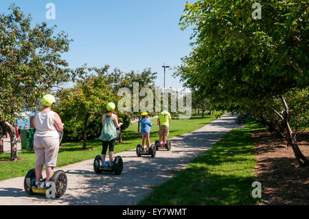 Tourists on a Segway tour in Grant Park, Chicago. Stock Photo