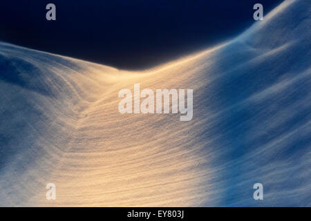 Snow drifts, shapes, textures and lines created by wind. Stock Photo