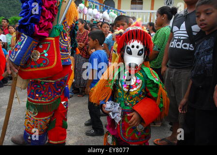 Guatemala Deer Dance traditional costumes and masks - Boy in forest animal costume and mask. Stock Photo