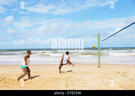 People playing beach foot volley, Brazil Stock Photo