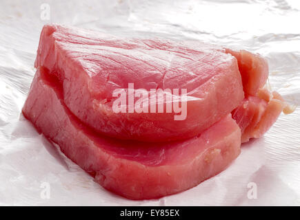 Tuna fish, fresh steaks ready for cooking an meal Stock Photo