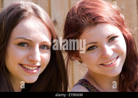 Portrait of two teenage girls smiling Stock Photo
