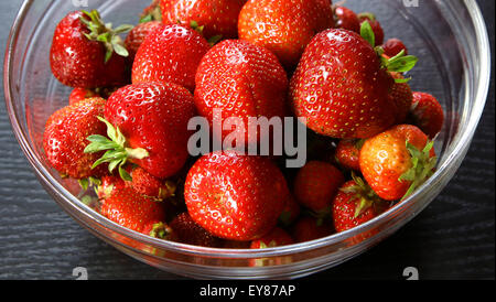 fresh strawberries in bowl straight from garden Stock Photo