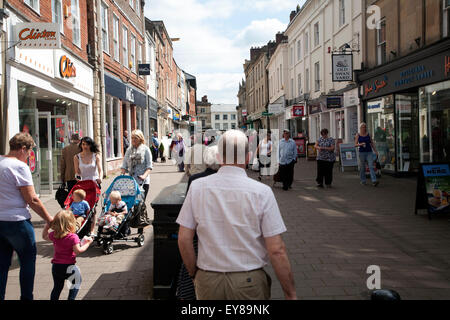 People in pedestrianised shopping street,  The Brittox, Devizes, Wiltshire, England, UK Stock Photo