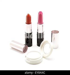 lipstick and  eyeshadow isolated on white background Stock Photo