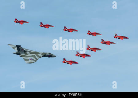 Vulcan in formation with the red arrows at RIAT fairford 2015 Stock Photo