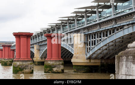 Blackfriars Railway Bridge, with the pillars of the old bridge ( 1864 ) in the foreground,  London, England, Great Britain, UK. Stock Photo