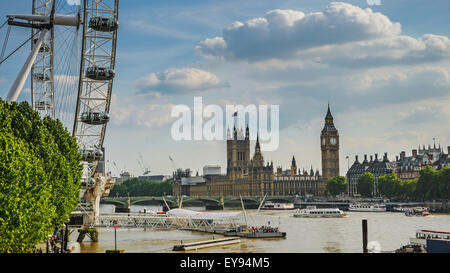 London Eye, Big Ben and Houses of Parliament in London City at sunset Stock Photo