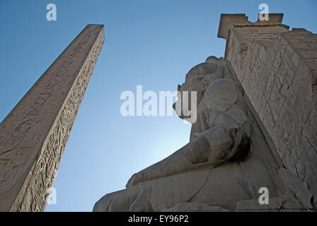 Luxor, Egypt. Temple of Luxor (Ipet resyt): the obelisk and the statue of Usermaatra Setepenra Ramses II the Great (1303-1212 b. Stock Photo