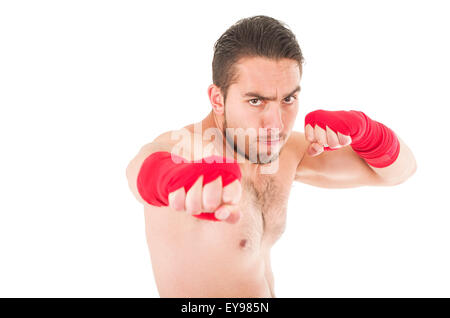 martial arts fighter wearing red shorts and wristband Stock Photo