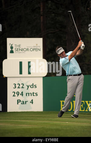 Sunningdale, UK. 23rd July, 2015. Nick Faldo of England plays his tee shot on the 11th hole during the first round of The Senior Open Championship at Sunningdale Golf Club on July 23, 2015 in Sunningdale, England. Credit:  David Partridge / Alamy Live News Stock Photo