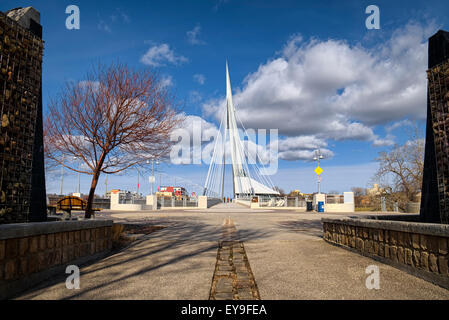 Named in honor of Louis Riel, Esplanade Riel is a pedestrian-only side-spar cable-stayed bridge which spans the Red River Stock Photo