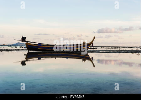 Fishing boat in the sea with morning light, Rawai beach, Phuket Thailand Stock Photo