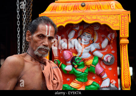 Puri, India. 17th July, 2015. Amid tight security, the millennium?s first Nabakalebar Rath Yatra of Lord Jagannath was held here on 18 July, Saturday in Puri with religious fervor, enthusiasm. More than 30 Lakhs or 3 millions pilgrims attended this festival. The Nabakalebera or New Body of 'Chaturddhamurati'(the four deities) occurred after 19th year which is last held at 1996. Panda in Ratha . © Saikat Paul/Pacific Press/Alamy Live News Stock Photo