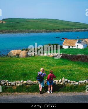 Clifden, Co Galway, Ireland; People Hiking Along The Sky Road Stock Photo