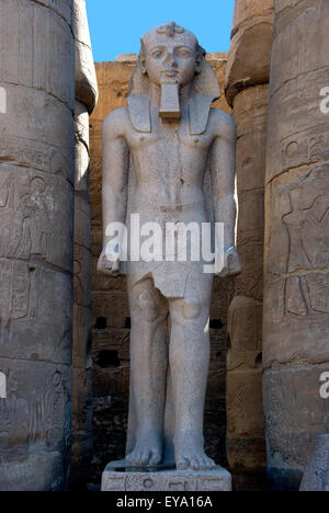Luxor, Egypt. Temple of Luxor (Ipet resyt): big statue of the king Ramses II  (1303-1212 b.C.) Stock Photo