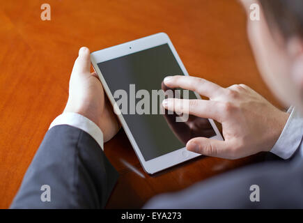 Man working with the tablet Stock Photo