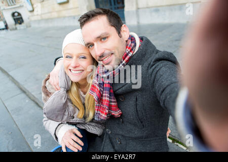 View of a Young couple on holidays taking selfie Stock Photo