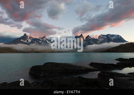 Sunrise over Cuernos del Paine and Lago Pehoe, Torres del Paine National Park, Chilean Patagonia, Chile Stock Photo