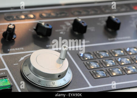 The control panel with which the operator interacts with the CNC machine. Stock Photo