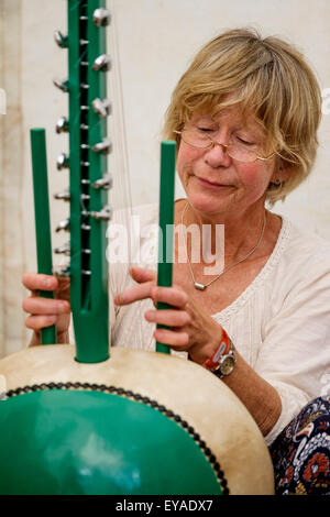 Atmosphere at WOMAD (World of Music, Arts and Dance)  Festival at Charlton Park on 25/07/2015 at Charlton Park, Malmesbury.  Kora Workshops - The kora is a 21-string lute-bridge-harp used extensively in West Africa. Picture by Julie Edwards/Alamy Live News