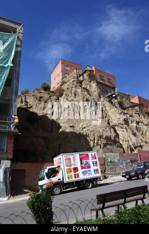 Precariously built houses (probably without any sort of authorisation) on an unstable steep earth / soil hillside on Calle Belzu, La Paz, Bolivia Stock Photo
