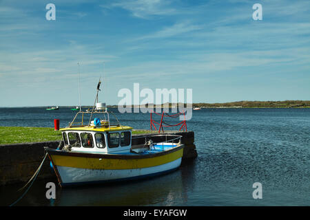 A boat moored along the coast; Kinvara, County Galway, Ireland Stock Photo