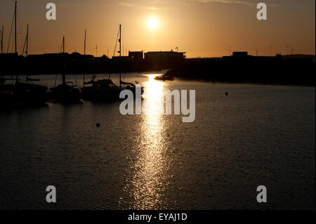Beautiful sunset on the peaceful harbor at Howth, Dublin, Ireland Stock Photo