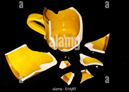 Broken Orange Coffe Cup Stock Photo