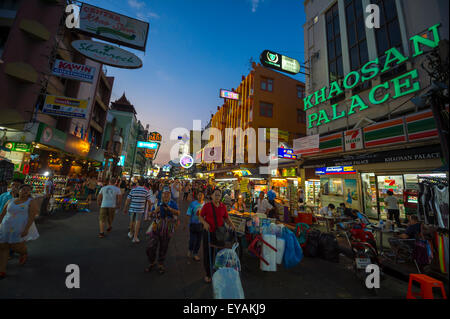 BANGKOK, THAILAND - NOVEMBER 16, 2014: Tourist pedestrians crowd a typical evening scene on Khao San Road backpacker street. Stock Photo