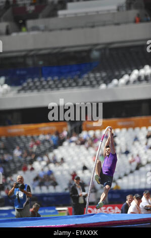 Augusto Dutra (BRA) competing in the Men's Pole Vault competition, on day two of the Sainsbury's Anniversary Games at the Queen Elizabeth II Olympic Park, London. Dutra won bronze by clearing the bar at a height of 5.81m. Stock Photo