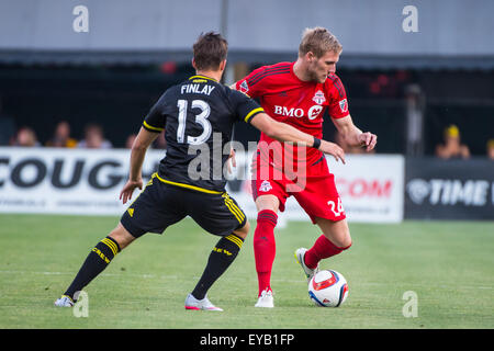 Columbus Crew SC midfielder Ethan Finlay (13) andToronto FC defender Damien Perquis (24) during the first half of the match between Toronto FC and Columbus Crew SC at MAPFRE Stadium, in Columbus OH. on July 25, 2015.Columbus Crew SC 2 - Toronto FC 0.Photo Credit: Dorn Byg/CSM Stock Photo