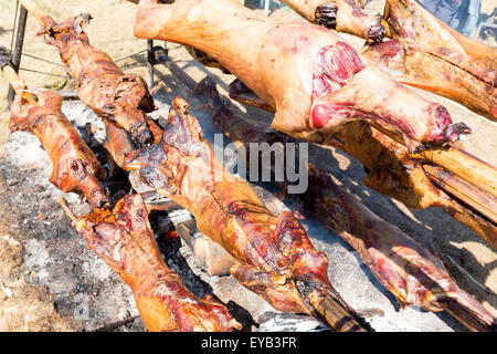 Traditional Bulgarian roasting lamb barbecue. It is roasted meat over an open fire, cooked in a special way. Most often the barb Stock Photo