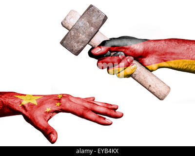 Flag of Germany overprinted on a hand holding a heavy hammer hitting a hand representing the China. Conceptual image for politic Stock Photo