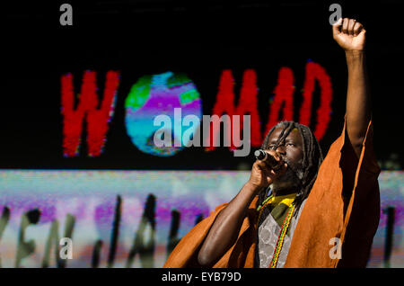 Malmesbury, Wiltshire, UK. 25th July, 2015. Politically-edged reggae superstar Tiken Jah Fakoly, from Côte d'Ivoire, performing live on the Open Air Stage on the second day of WOMAD music festival, Charlton Park, England, UK. Credit:  Francesca Moore/Alamy Live News Stock Photo