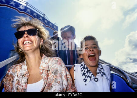 A family enjoying a ride on the scenic railway roller coaster. Great Yarmouth Pleasure Beach. Norfolk. England. UK Stock Photo