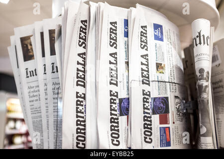 A selection of foreign newspapers on sale Stock Photo