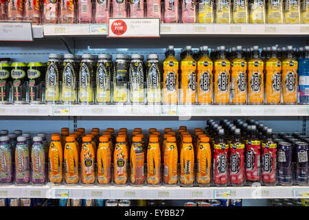 Supermarket fridges displaying a range of sugary fizzy drinks Stock Photo