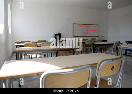 A whiteboard in the classroom at school with the messagelet is begin the summer holidays written with red marker on it symbolizi Stock Photo