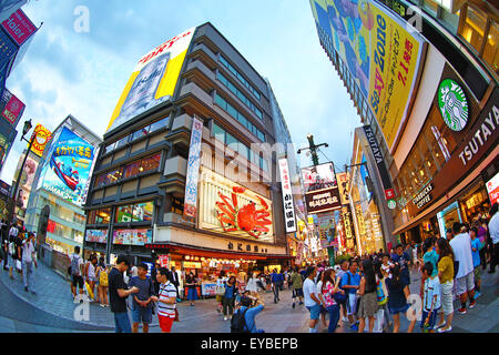 Night scene of illuminations and neon lights on buildings and shops of Namba in Osaka, Japan Stock Photo