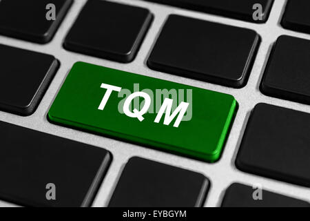 TQM or Total quality management button on keyboard, business concept Stock Photo